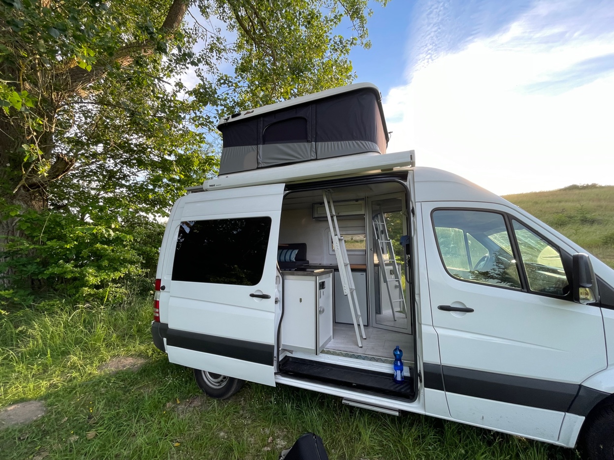 Mercedes Sprinter Motorhome with pop-up roof and ladder